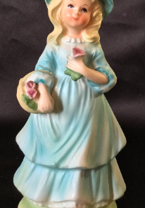 Vintage Avon Bottle 1979 Hand painted exclusively for AVON products - Figurine -Girl / Lady holding roses /bouquet