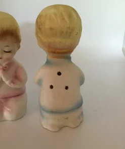 Vintage ceramic salt and pepper shakers with praying children in pastel clothing 5