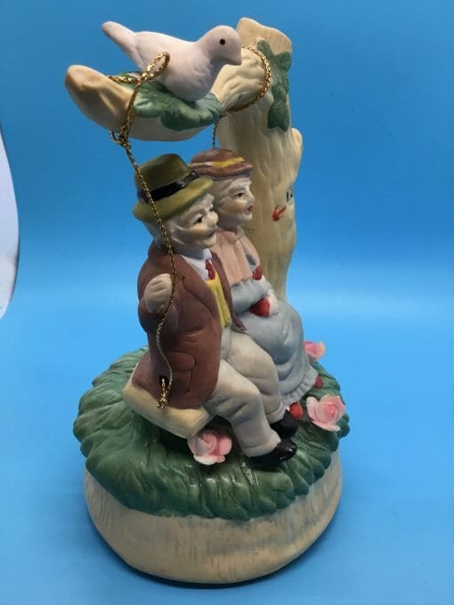 1983 Porcelain Rotating Music Box – Couple on Swing, “Through The Years” by MSR Imports