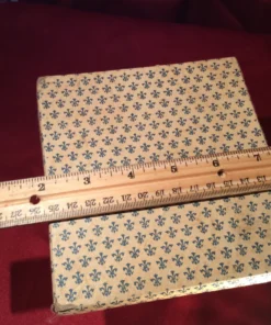 Box with ruler measurement of rare antique dragon knives set, top view