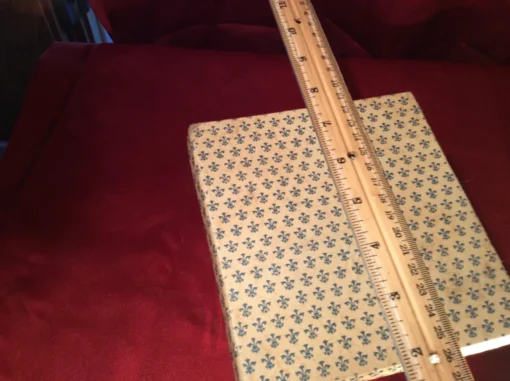 Box with ruler measurement of rare antique dragon knives set, top view 01