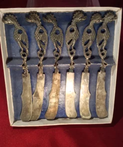 Rare antique dragon knife set – front view showing all blades and handles in original packaging