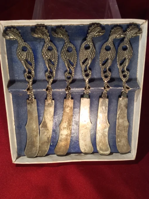 Rare antique dragon knife set – front view showing all blades and handles in original packaging