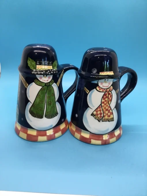 A festive duo of vintage snowmen salt and pepper shakers, ready to add cheer to your holiday table or winter decor display. 6