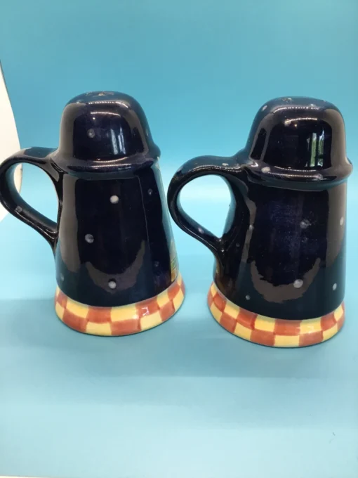 A festive duo of vintage snowmen salt and pepper shakers, ready to add cheer to your holiday table or winter decor display. 7