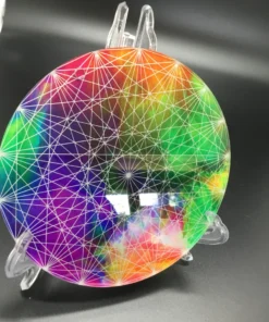 Tilted view of colorful charger plate reflecting white light in studio setting 01