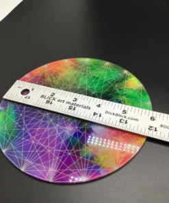 Rainbow geometric plate measured with ruler for scale (approx. 6
