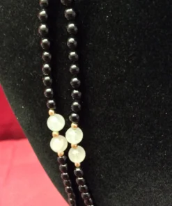 Close-up of white opalescent accent bead