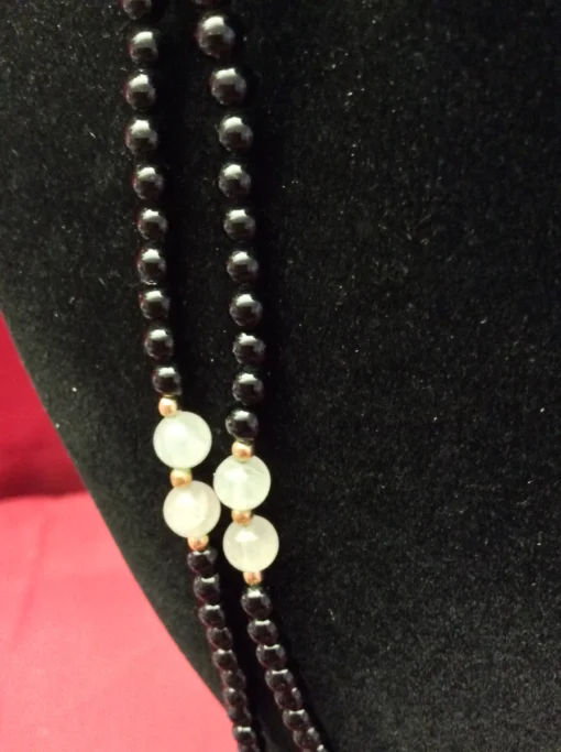 Close-up of white opalescent accent bead