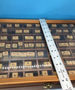 uler measuring vintage rubber stamp set vertically inside wooden case