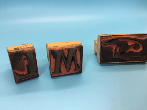 Rubber stamps for letters M and L and vintage pointing finger symbol