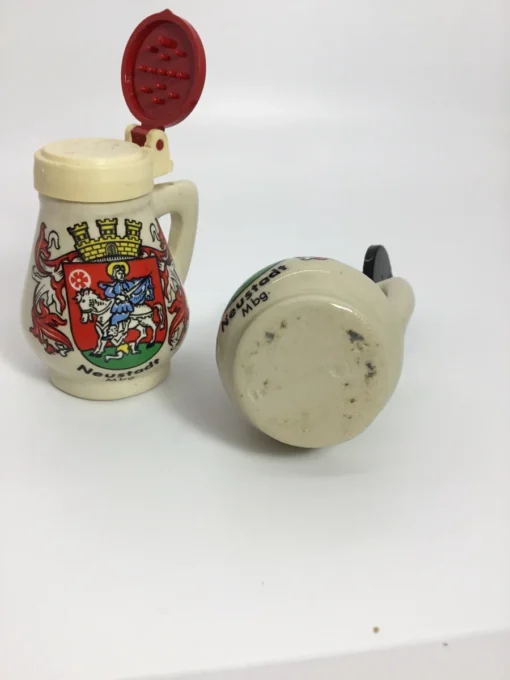 Vintage Neustadt ceramic salt and pepper shakers with lids open