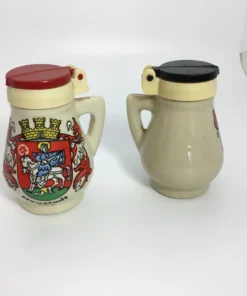 Front and back view of vintage Neustadt stein-style salt shakers