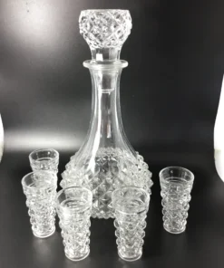 Full vintage diamond-cut crystal-style decanter set with six glasses, front view