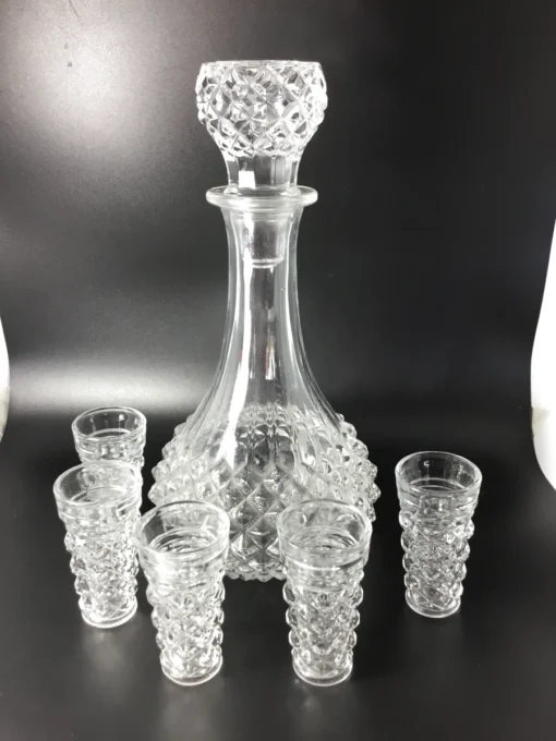 Full vintage diamond-cut crystal-style decanter set with six glasses, front view